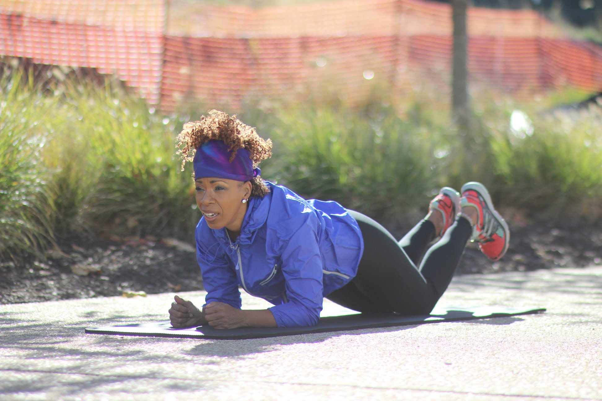 Candice Camille performing a modified plank.